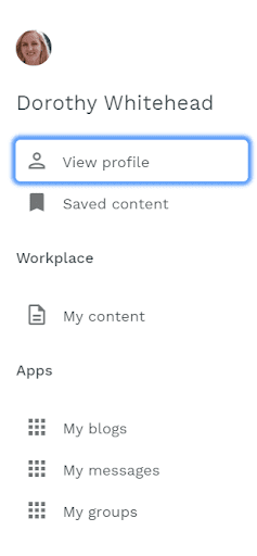 Profile menu displaying user image, name, with links to user profile and saved content, workplace and apps